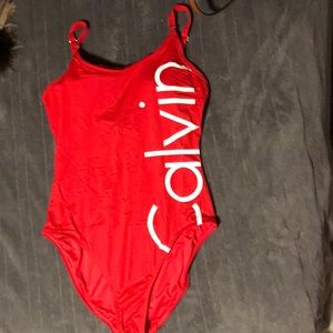 Red Calvin Klein one piece swim suit